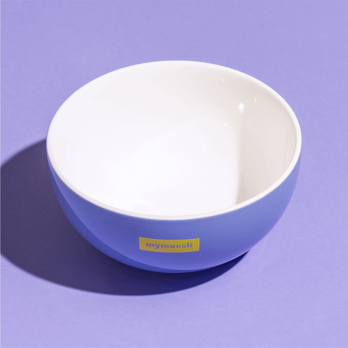 hellblaue Müslischale mit gelbem mymuesli Logo