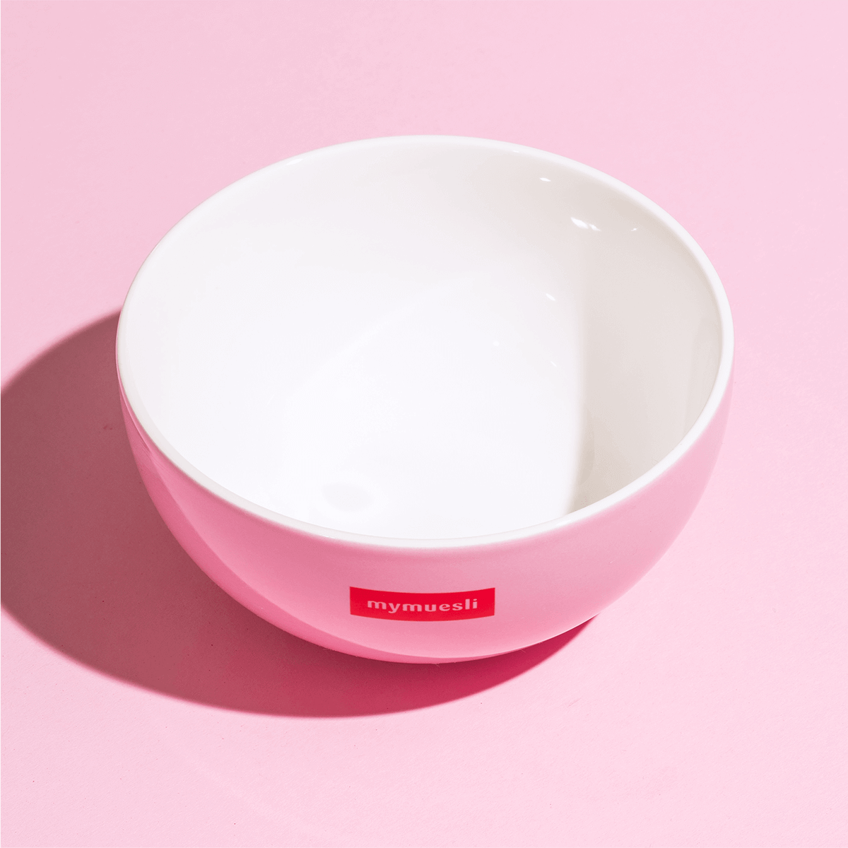 rosa Müslischale mit rotem mymuesli Logo