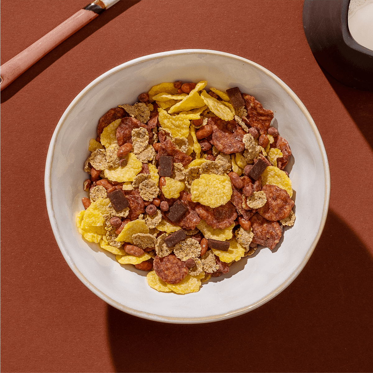 mymuesli Bio Glutenfreies Müsli Probierpaket enthält ein glutenfreies Schoko Müsli mit Schokocornflakes, Cornflakes, Schokolade und Cocopops