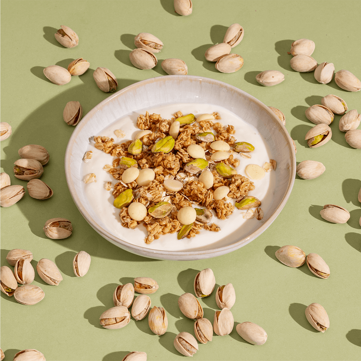 slider04-white-choc-pistachio-crunch_91e64c00-bdb6-47fb-8e05-4982548589c2.png